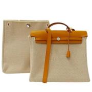 Pre-owned Canvas shoulder-bags Hermès Vintage , Beige , Dames