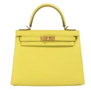 Pre-owned Leather handbags Hermès Vintage , Yellow , Dames