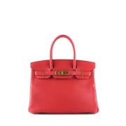 Pre-owned Leather totes Hermès Vintage , Red , Dames