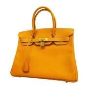 Pre-owned Leather handbags Hermès Vintage , Orange , Dames