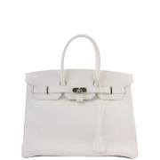 Pre-owned Canvas handbags Hermès Vintage , White , Dames