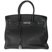 Pre-owned Leather handbags Hermès Vintage , Black , Dames