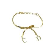 Pre-owned Metal bracelets Dior Vintage , Yellow , Dames