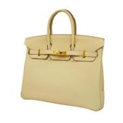 Pre-owned Leather handbags Hermès Vintage , Beige , Dames