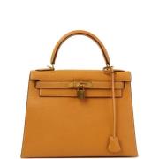 Pre-owned Canvas handbags Hermès Vintage , Orange , Dames