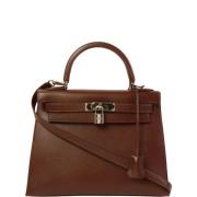 Pre-owned Canvas handbags Hermès Vintage , Brown , Dames