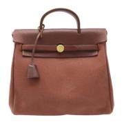 Pre-owned Canvas backpacks Hermès Vintage , Brown , Dames