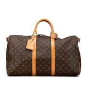 Pre-owned Canvas handbags Louis Vuitton Vintage , Brown , Dames