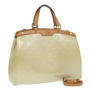 Pre-owned Leather handbags Louis Vuitton Vintage , Beige , Dames