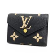 Pre-owned Fabric wallets Louis Vuitton Vintage , Black , Dames