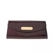 Pre-owned Leather clutches Louis Vuitton Vintage , Red , Dames