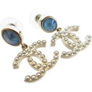 Pre-owned Metal earrings Chanel Vintage , Blue , Dames