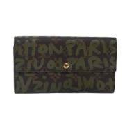 Pre-owned Canvas wallets Louis Vuitton Vintage , Green , Dames