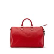 Pre-owned Leather handbags Louis Vuitton Vintage , Red , Dames