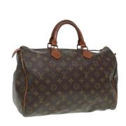 Pre-owned Canvas handbags Louis Vuitton Vintage , Brown , Dames