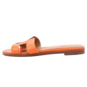 Pre-owned Leather sandals Hermès Vintage , Orange , Dames