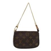 Pre-owned Canvas pouches Louis Vuitton Vintage , Brown , Dames