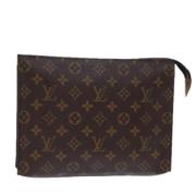 Pre-owned Canvas pouches Louis Vuitton Vintage , Brown , Dames