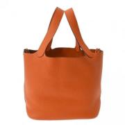 Pre-owned Leather handbags Hermès Vintage , Orange , Dames