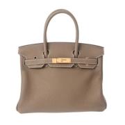 Pre-owned Leather handbags Hermès Vintage , Brown , Dames