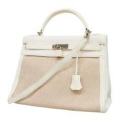 Pre-owned Canvas handbags Hermès Vintage , White , Dames