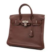 Pre-owned Leather handbags Hermès Vintage , Brown , Dames