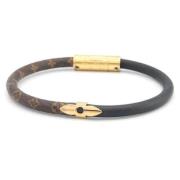 Pre-owned Fabric bracelets Louis Vuitton Vintage , Yellow , Dames