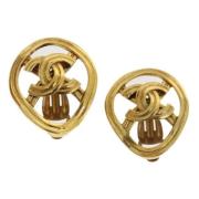 Pre-owned Metal earrings Chanel Vintage , Yellow , Dames