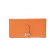 Pre-owned Leather wallets Hermès Vintage , Orange , Dames