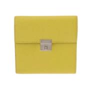 Pre-owned Leather wallets Hermès Vintage , Yellow , Dames