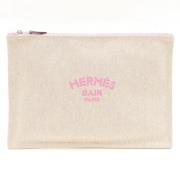 Pre-owned Canvas clutches Hermès Vintage , Beige , Dames