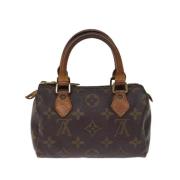 Pre-owned Canvas handbags Louis Vuitton Vintage , Brown , Dames