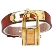 Pre-owned Metal watches Hermès Vintage , Yellow , Dames