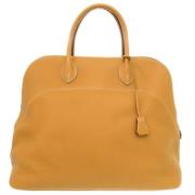 Pre-owned Fabric handbags Hermès Vintage , Yellow , Heren