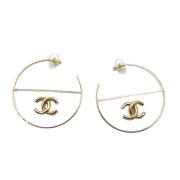 Pre-owned Fabric earrings Chanel Vintage , Yellow , Dames