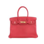 Pre-owned Leather handbags Hermès Vintage , Pink , Dames