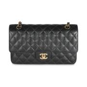 Pre-owned Leather clutches Chanel Vintage , Black , Dames