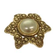 Pre-owned Metal brooches Chanel Vintage , Yellow , Dames