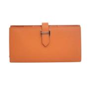 Pre-owned Leather wallets Hermès Vintage , Orange , Dames