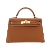 Pre-owned Leather handbags Hermès Vintage , Brown , Dames