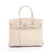 Pre-owned Leather handbags Hermès Vintage , Beige , Dames