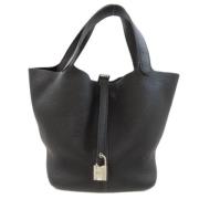 Pre-owned Leather handbags Hermès Vintage , Black , Dames