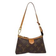 Pre-owned Canvas pouches Louis Vuitton Vintage , Brown , Dames