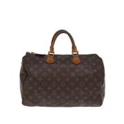 Pre-owned Canvas handbags Louis Vuitton Vintage , Brown , Dames