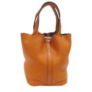 Pre-owned Leather handbags Hermès Vintage , Orange , Dames