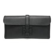 Pre-owned Leather clutches Hermès Vintage , Black , Dames