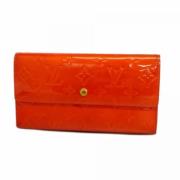 Pre-owned Fabric wallets Louis Vuitton Vintage , Orange , Dames