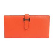 Pre-owned Leather wallets Hermès Vintage , Orange , Dames