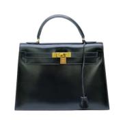 Pre-owned Leather handbags Hermès Vintage , Black , Dames