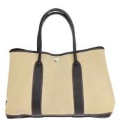 Pre-owned Canvas handbags Hermès Vintage , Beige , Dames